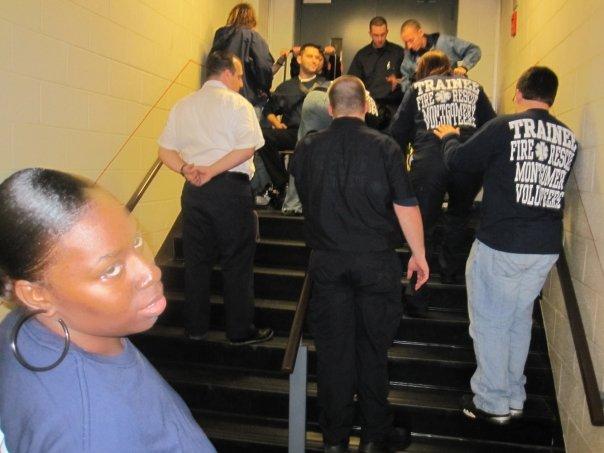 Lt. Keriakos looks over the use of the stair chair to move a patient during VBOC 09-06